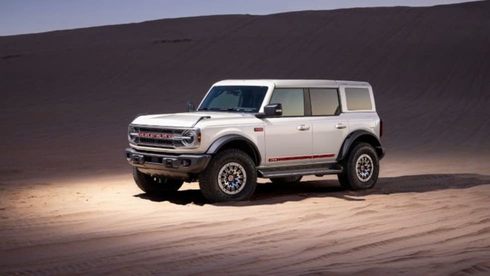 Photo of white 2026 Ford Bronco on a sandy beach