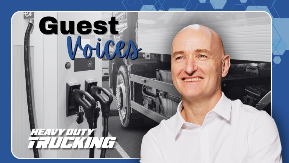 Guest Voices column header with headshot of Neil Cawse against backdrop of an electric truck charging