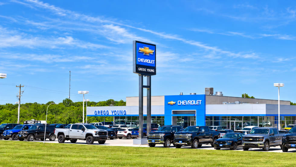 The outside of a blue Gregg Young Chevrolet dealership.