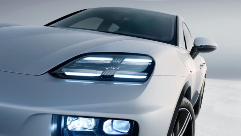 Headlight of silver Porsche car