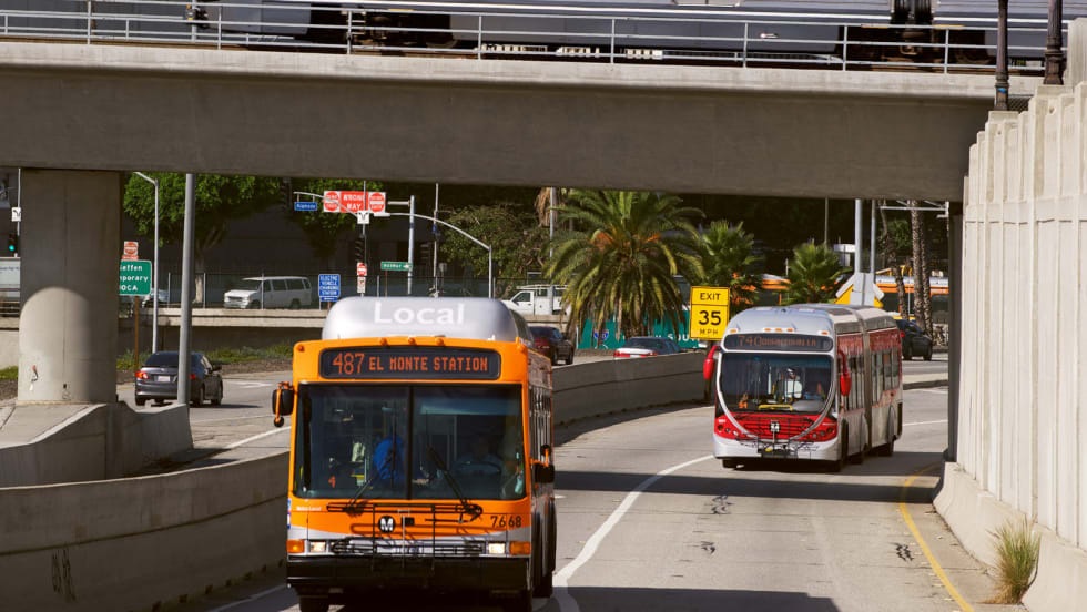 An LA Metro bus and railcar.