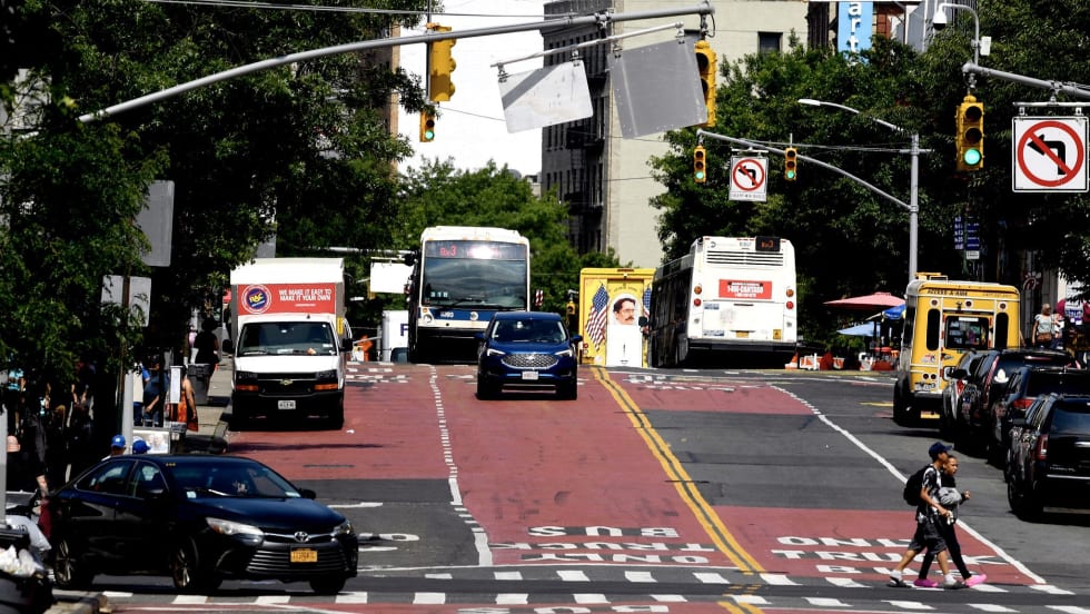 Bus driving down road demonstrating ACE