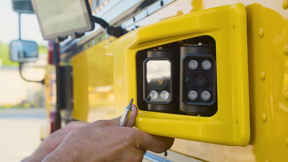 BusPatrol cameras on the side of a school bus.