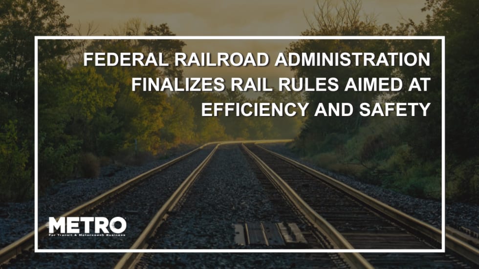 An image of empty railroad tracks in Minnesota with white text reading "Federal Railroad Administration Finalizes Rail Rules Aimed at Efficiency and Safety."