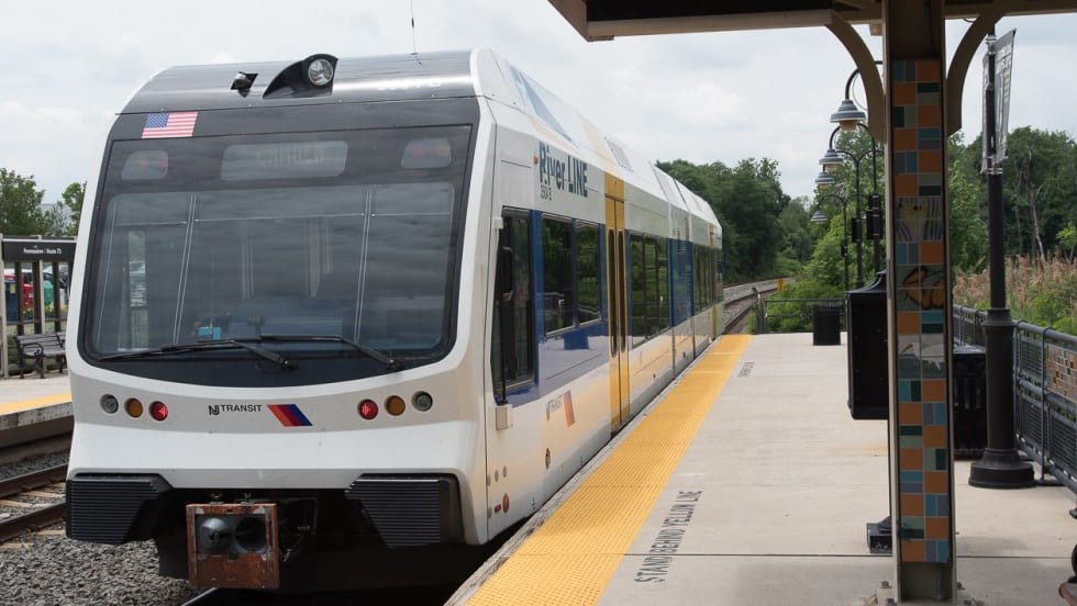 An NJ TRANSIT railcar at a station