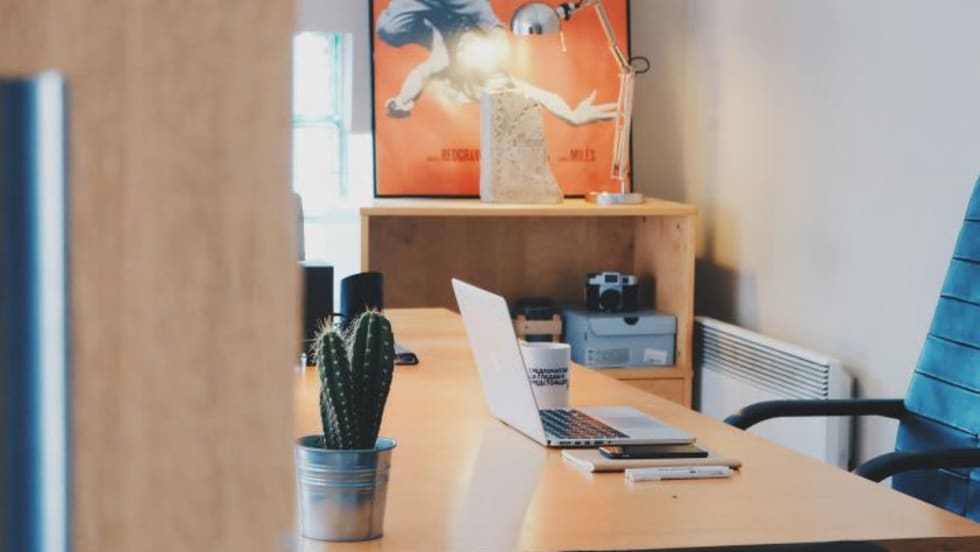 Photo of desk in sunny office