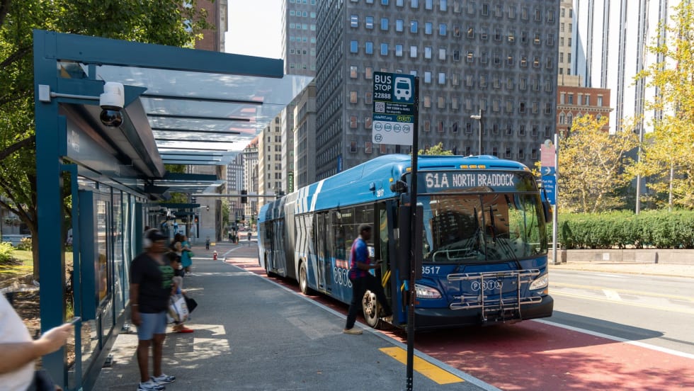 PRT bus stop with articulated bus.