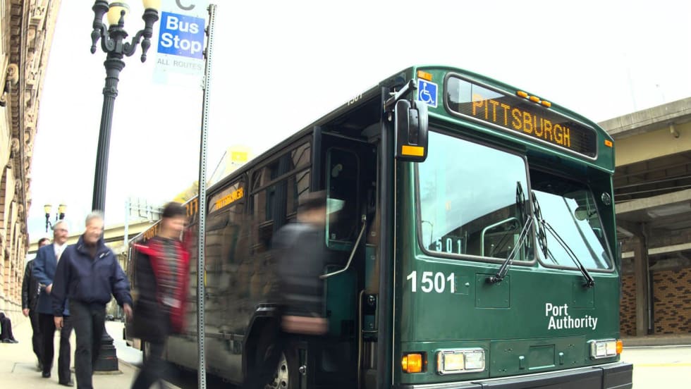 Passengers boarding a PRT bus