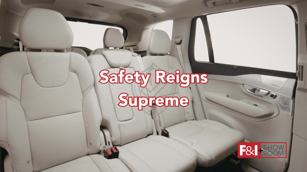 back seat of an SUV, cream colored leather, text Safety Reigns Supreme, F&I and Showroom logo