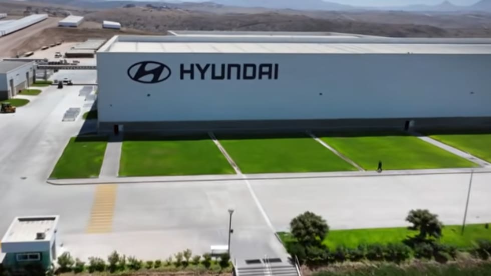 Factory illustration building with Hyundai on the side