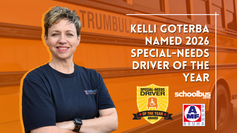 Kelli Goterba, the 2026 Special-Needs Driver of the Year, stands with her arms crossed in front of a Trumbull County Board of Developmental Disabilities school bus.