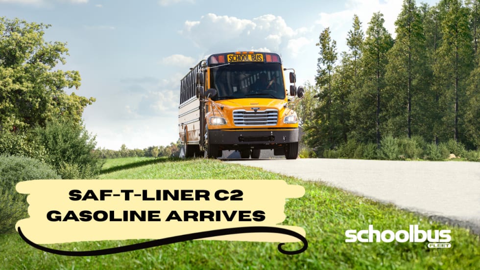 A yellow school bus drives along a rural road surrounded by green grass and trees under a partly cloudy sky. Overlaid text reads “SAF-T-LINER C2 GASOLINE ARRIVES,” with the School Bus Fleet logo in the corner.