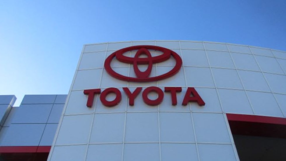 Photo of dealership sign with Toyota logo