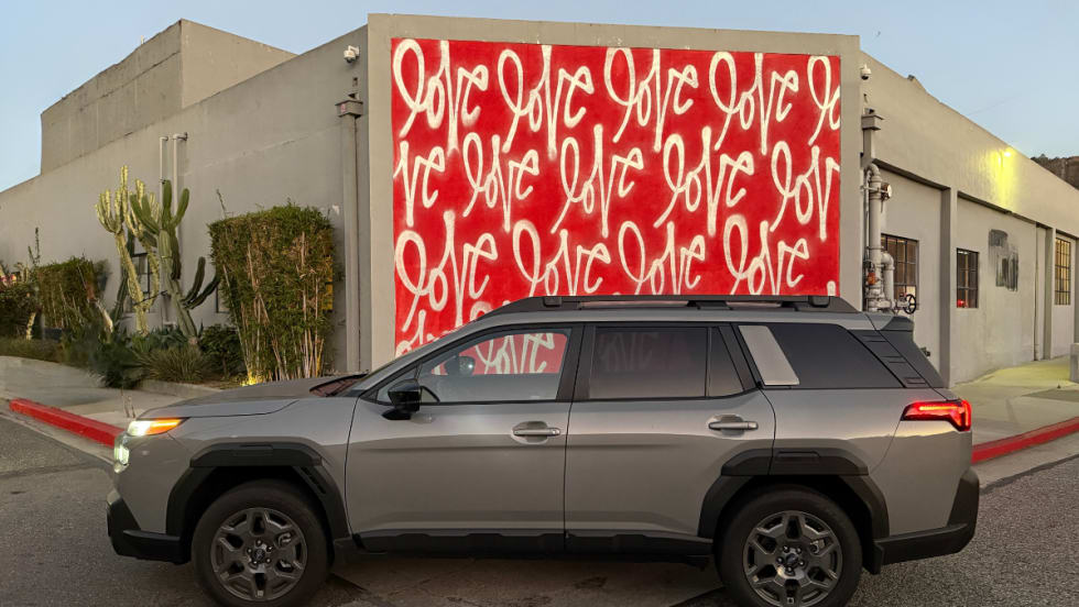 2026 Subaru Outback against a Love mural