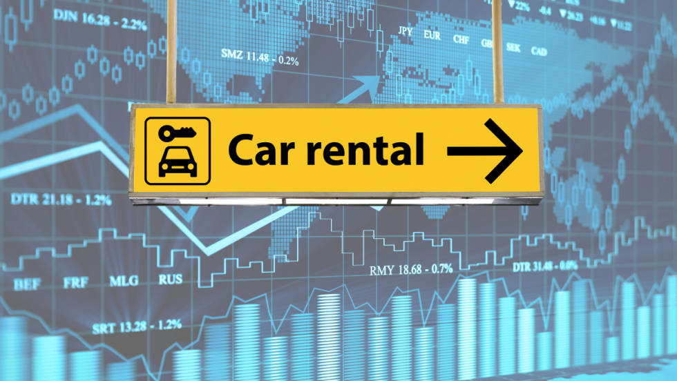 Car rental sign with financial graph in background