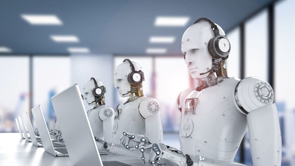AI robots typing at laptops