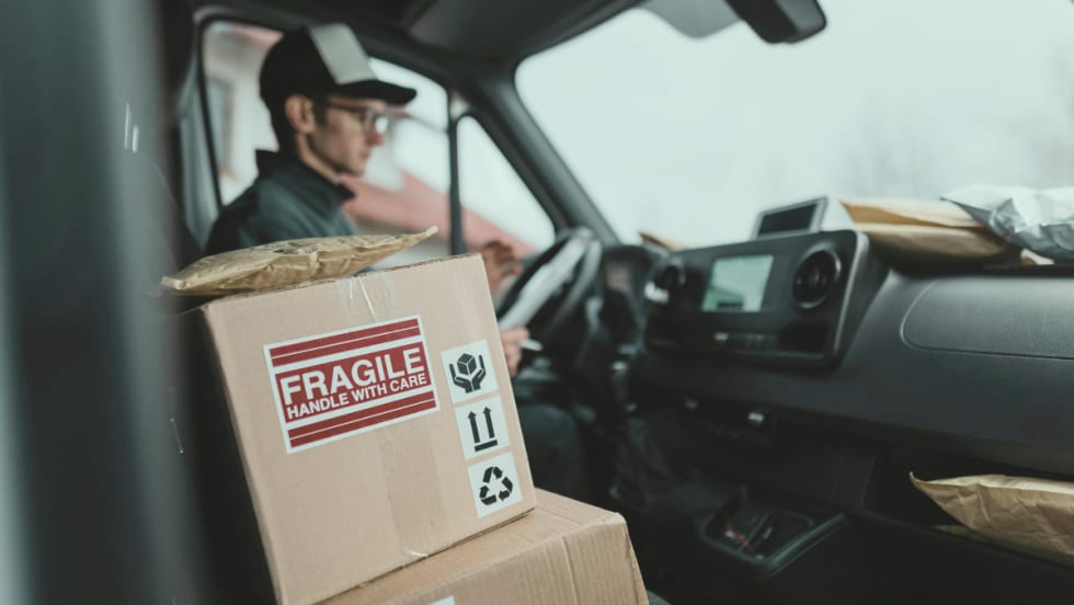 Packages in a delivery vehicle seat.