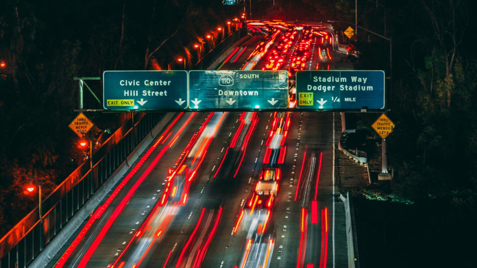 Long exposure of cars driving on a highway in Los Angeles, California.