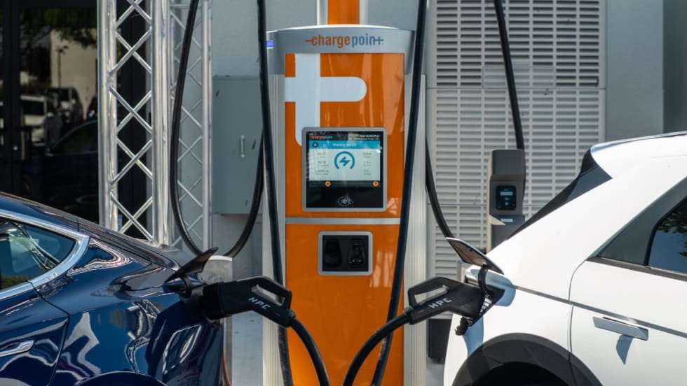 ChargePoint station charging two electric vehicles. 