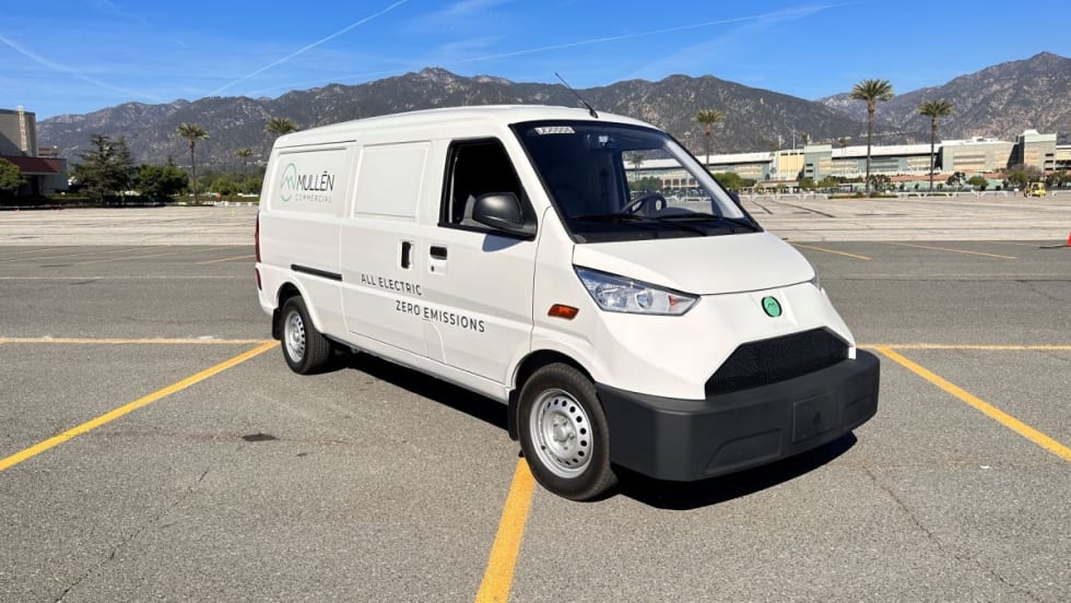 White Mullen ONE van in a parking lot.
