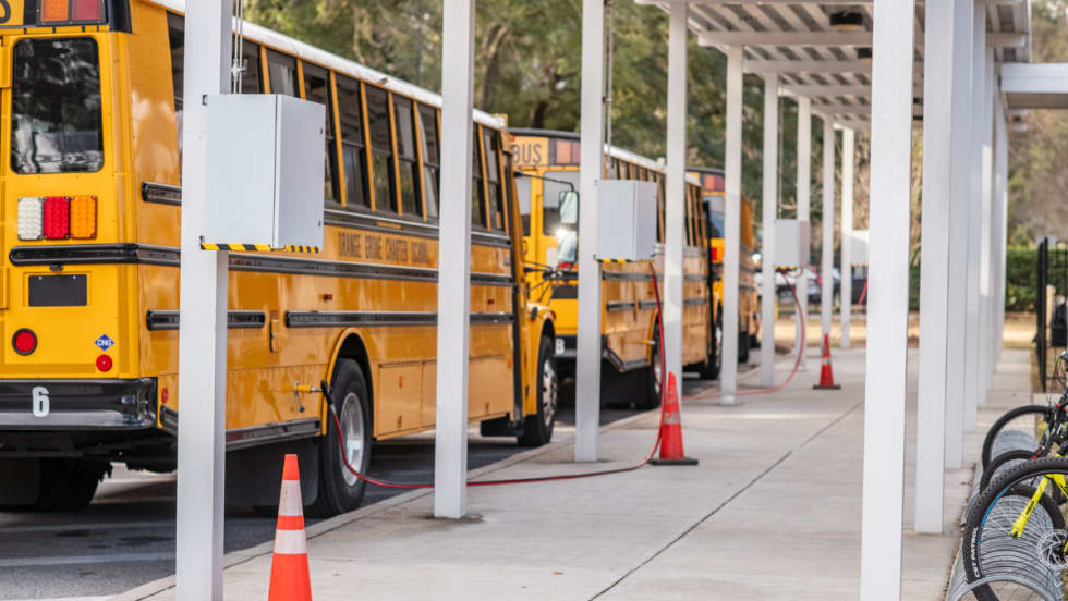 Buses lined while fueling at Orange Grove Charter School.