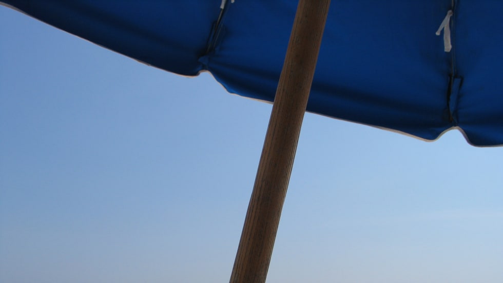View of Gulf of Mexico from under beach umbrella