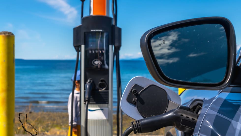 electric vehicle charging in front of ocean view