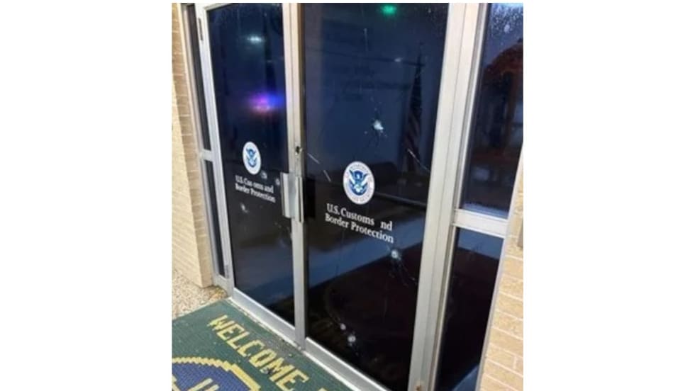 U.S. Customs and Border Protection entrance with official agency doors and welcome mat