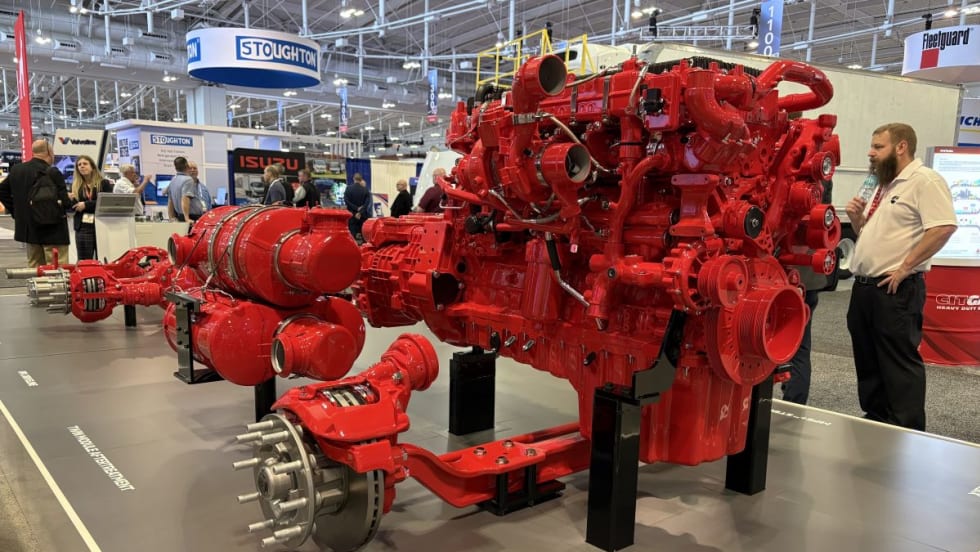 Red Cummins X15 powertrain display at TMC