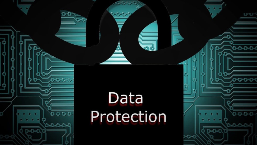 A lock and giant black chain with data protection imprinted on the lock.