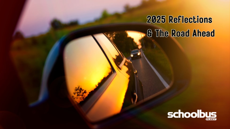 photo of a car's rear-view mirror of the road behind them and text that says "2025 reflections"