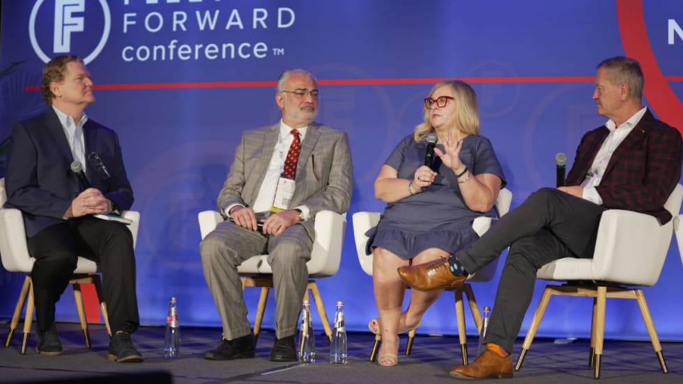 Panelists on stage at FFC.
