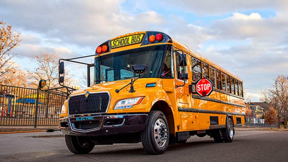 a school bus with illuminated signs