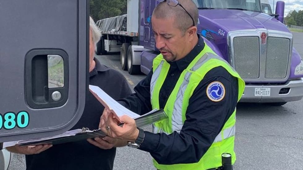 DOT inspection officer.