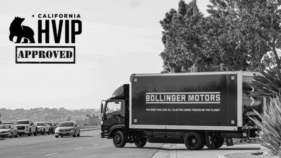 A black and white photo of a Bollinger Motors B4 EV Truck wit the California HVIP logo.