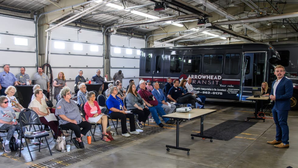 Attendees listening to an presentation at the Arrowhead Transit RideAmart 2025 launch event.