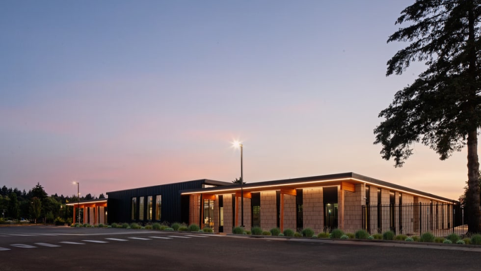 Exterior image of C-TRAN's campus expansion during sunrise.