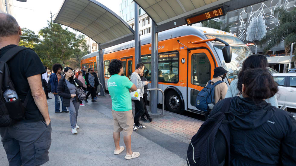 Passengers preparing to board LA Metro Bus