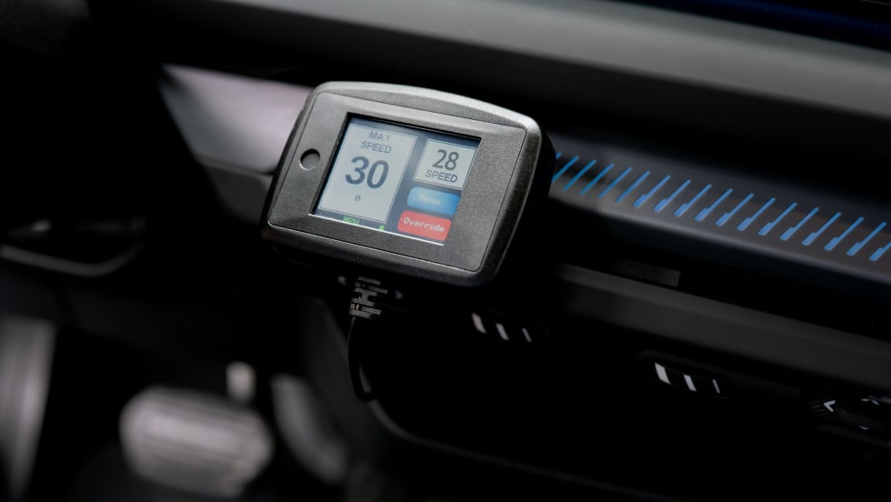 Digital vehicle display showing speed and driving information