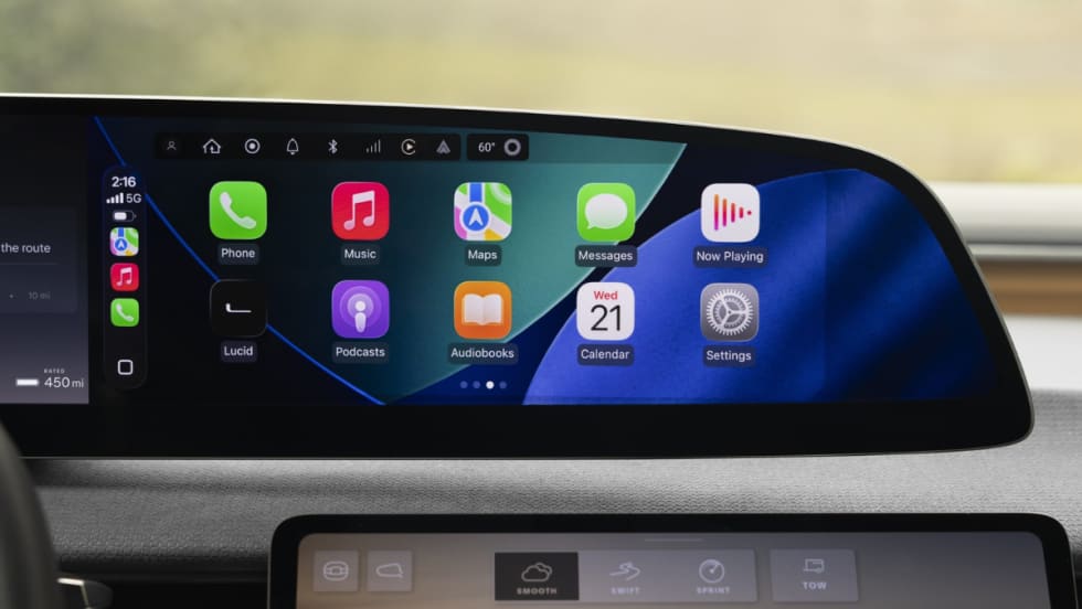 Lucid Gravity infotainment display showing Apple CarPlay interface after an over-the-air update enabling smartphone integration for navigation, messaging and media apps.