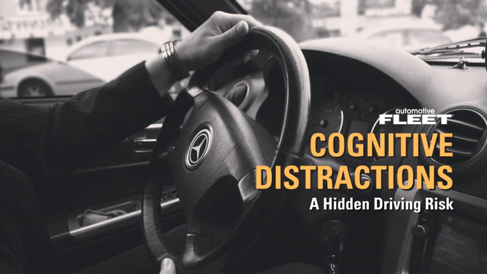 Black and white image of hands holding a steering wheel with text reading "Cognitive Distractions: A Hidden Driving Risk".