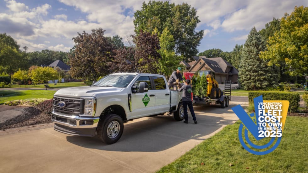 A white Ford truck with the Vincentric Best Fleet Value logo.