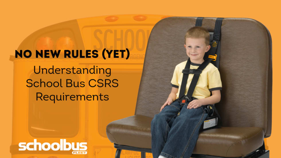 Young child secured in a child restraint system on a school bus seat, highlighting school bus CSRS requirements.