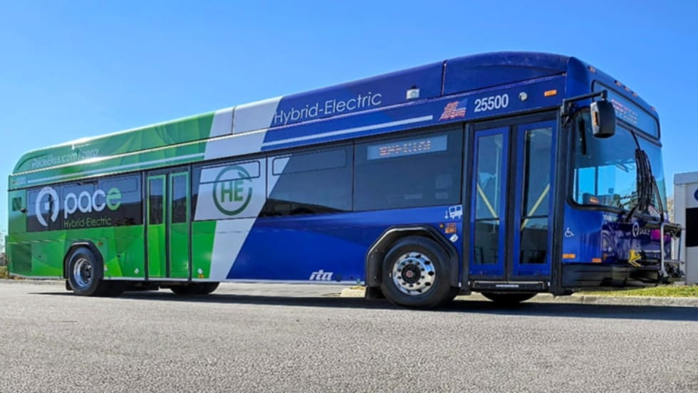 A green, white, and blue Pace bus.