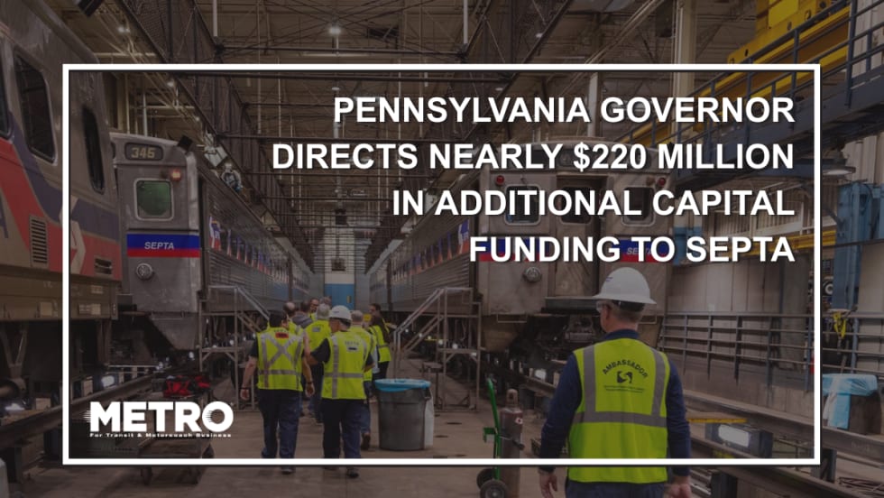 Workers walking in a railcar facility with text reading "Pennsylvania Governor Directs Nearly $220 Million in Additional Capital Funding to SEPTA."