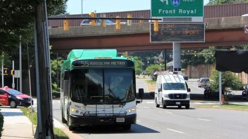 NVTC Bus driving down the street