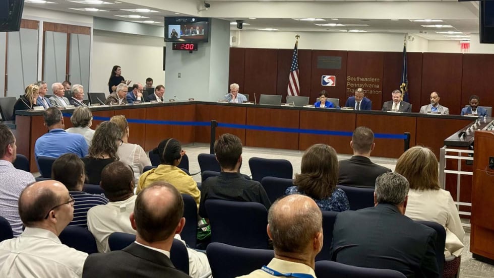 The SEPTA Board meets in a room.