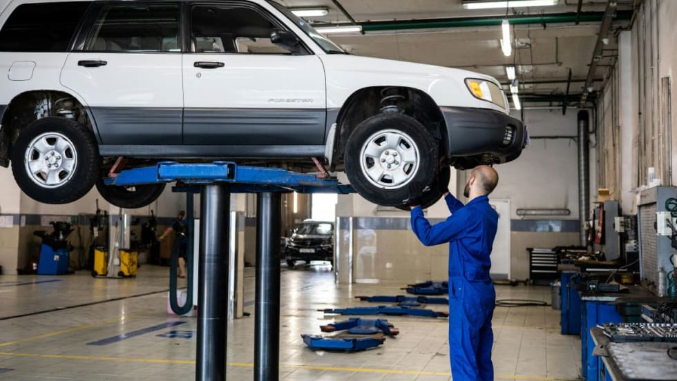 mechanic working on a vehicle