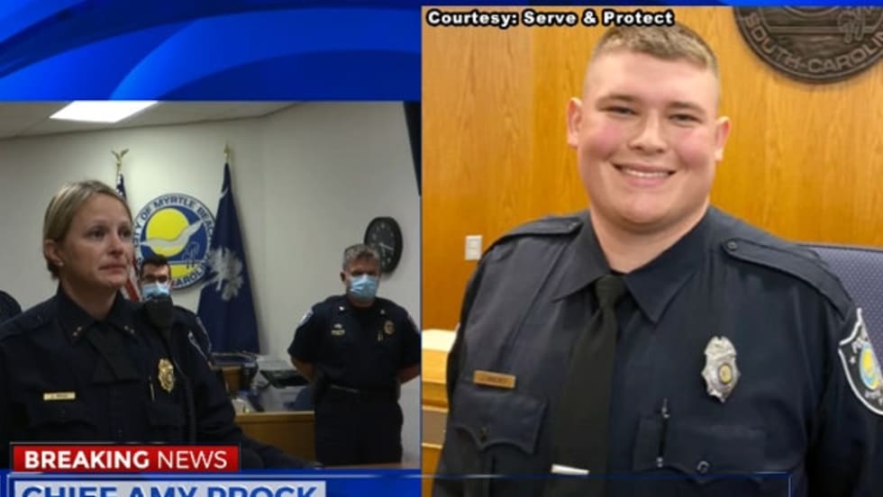 Officer Jacob Hancher was shot and killed as he responded to a call of a domestic dispute on Saturday night.[|CREDIT|]Screen grab of news report.