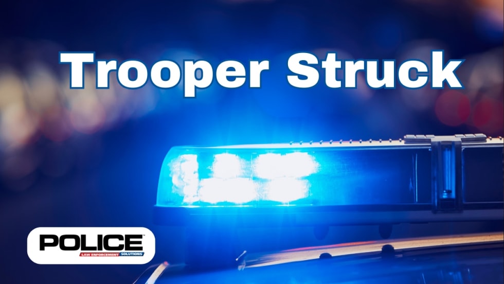 Police emergency light bar with blue flashing lights, headline 'Trooper Struck'